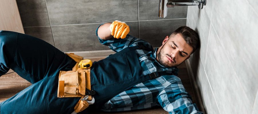 bearded-handyman-lying-on-floor-near-toolbox-in-ba-resize.jpg