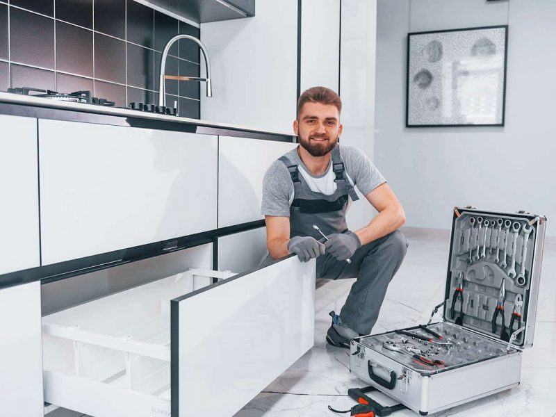 young-professional-plumber-in-grey-uniform-using-e-resize.jpg young-professional-plumber-in-grey-uniform-using-e-resize.jpg